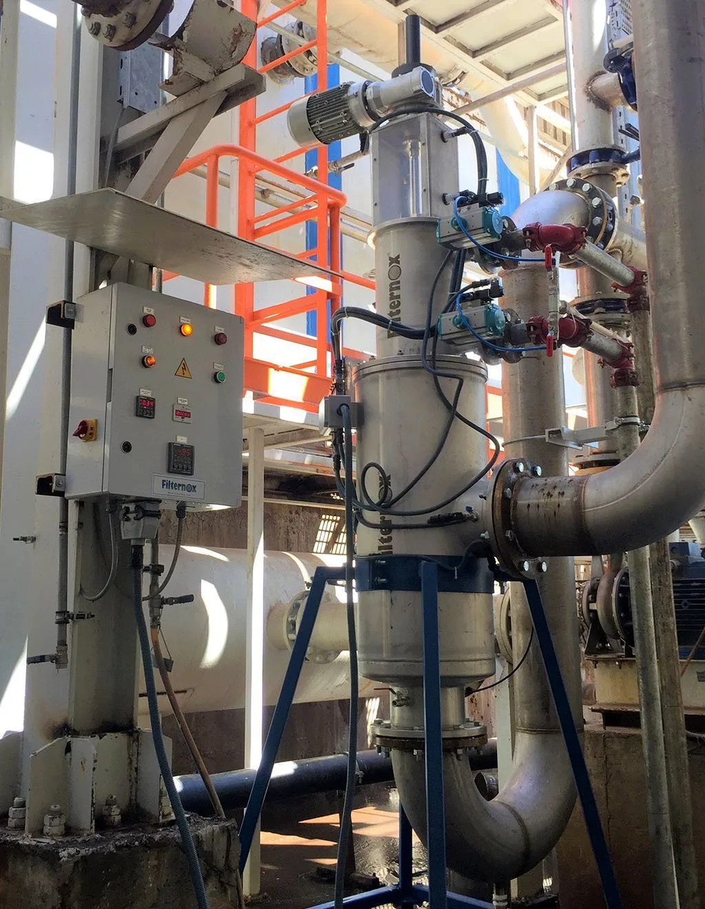 Cooling water filtration for heat exchanger protection – Wood processing plant